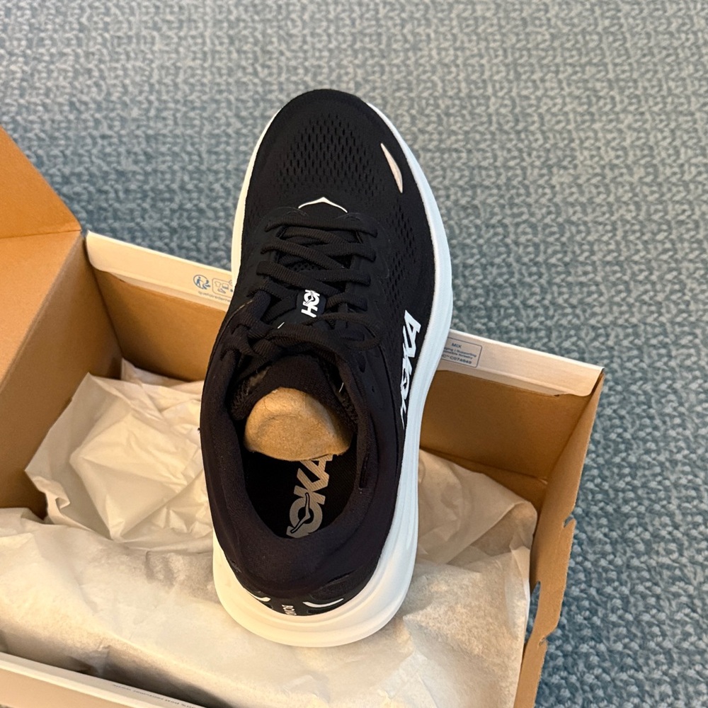 Women’s brand new Hoka sneaker   Never worn.  Right out of the box